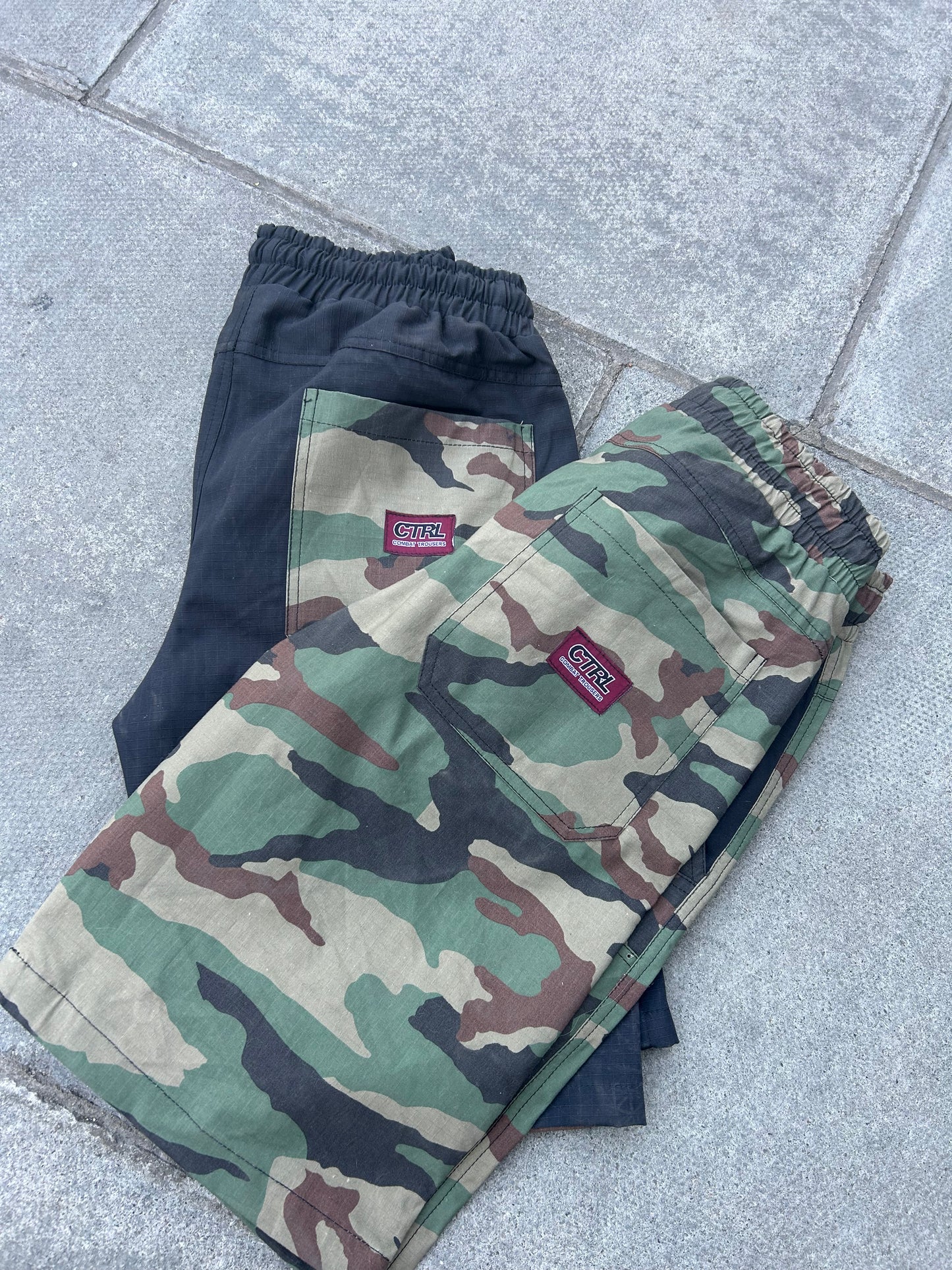 BLACK AND CAMO COMBAT SHORTS